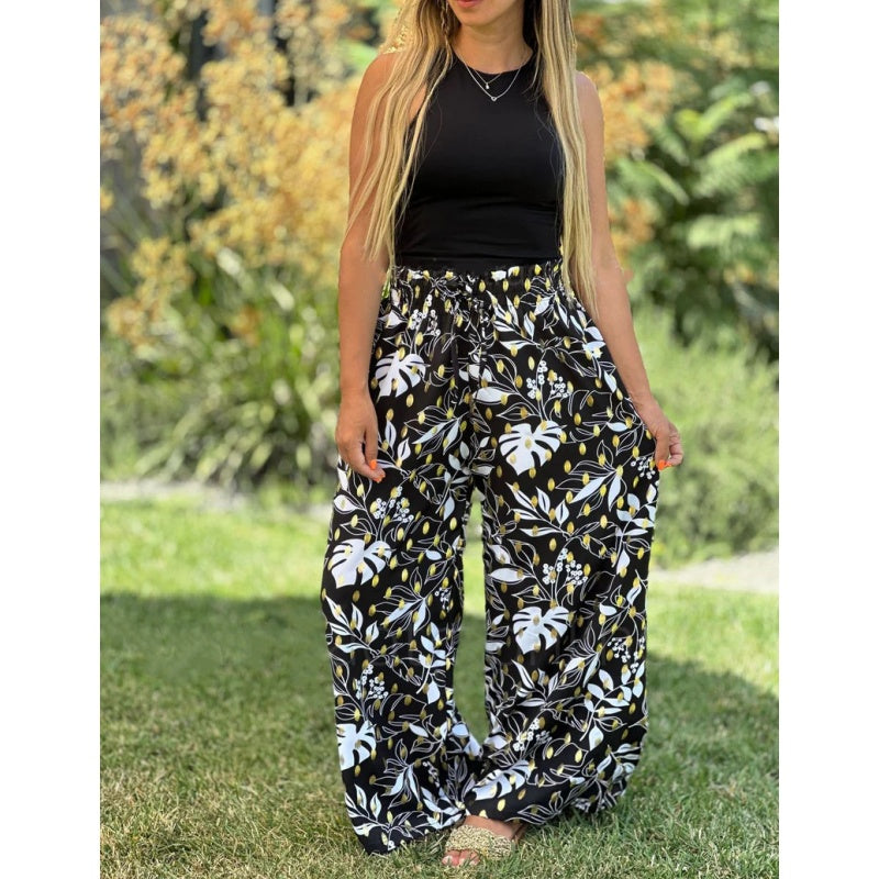 Comfort meets style, gold foil printed wide-leg pants give you the perfect look!