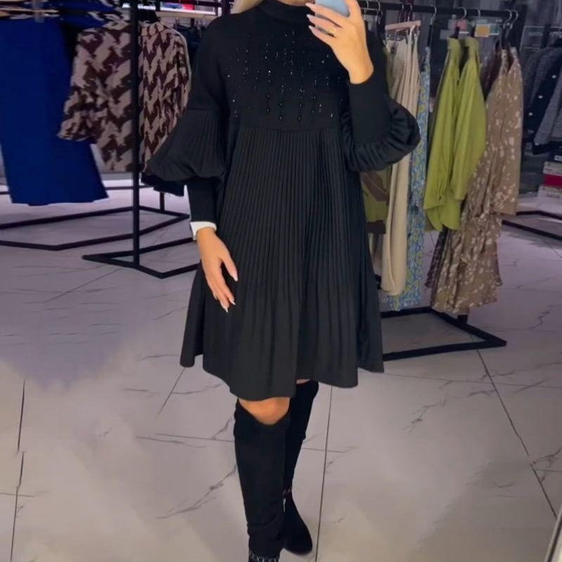 Elegant black pleated dress for women with lantern sleeves
