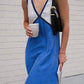 Fashionable V-neck sleeveless color blocked oversized dress with V-neck design, showcasing elegant neck lines