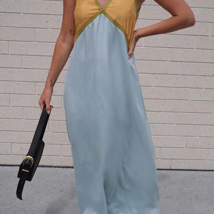 Fashionable V-neck sleeveless color blocked oversized dress with V-neck design, showcasing elegant neck lines