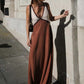 Fashionable V-neck sleeveless color blocked oversized dress with V-neck design, showcasing elegant neck lines