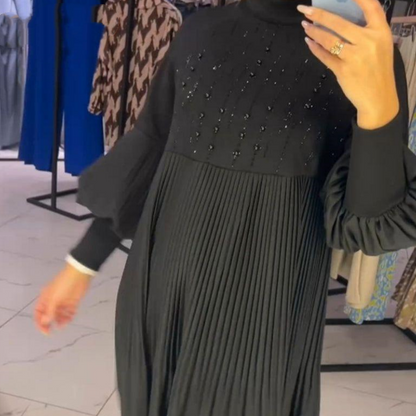 Elegant black pleated dress for women with lantern sleeves