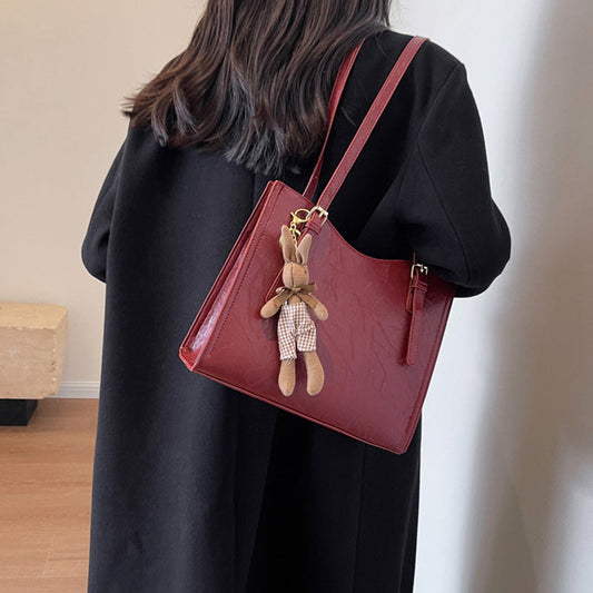 🎅 Pre Christmas special discount 🎄 Women's fashionable shoulder bag with doll pendant