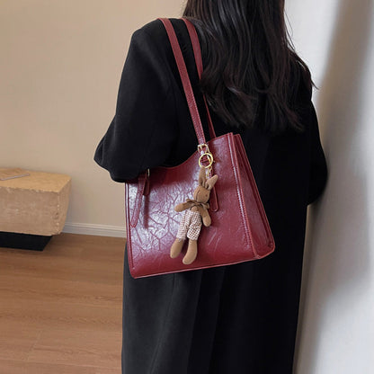 🎅 Pre Christmas special discount 🎄 Women's fashionable shoulder bag with doll pendant